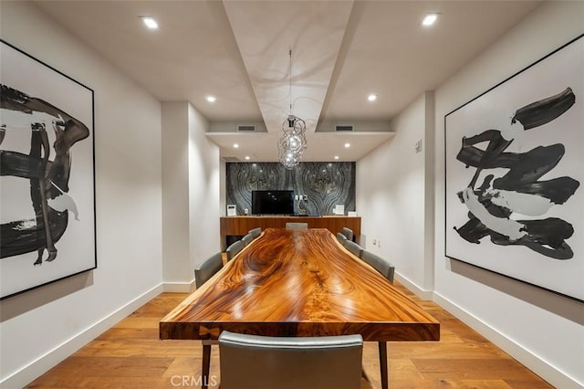 playroom with visible vents, baseboards, and light wood-style floors