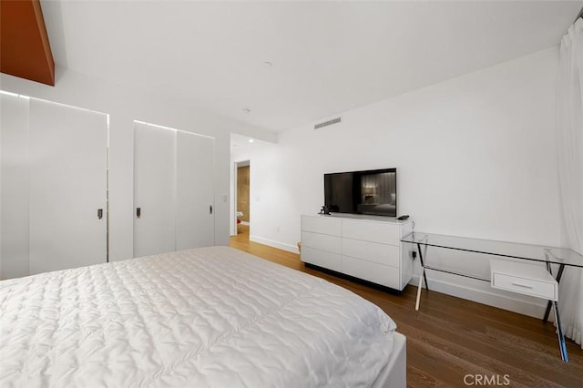 bedroom featuring hardwood / wood-style floors