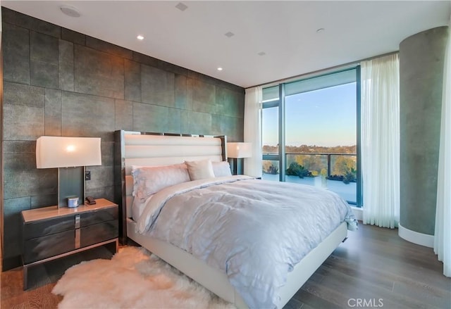 2855 5th Ave Unit 703, San Diego, CA 92103 - bedroom with wood finished floors, floor to ceiling windows, and recessed lighting