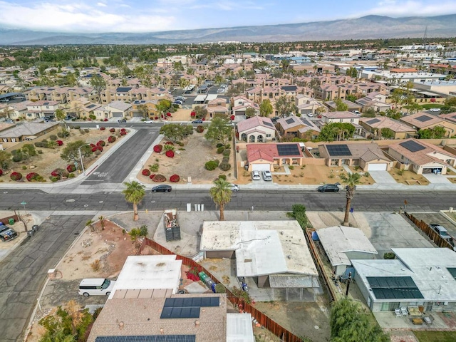 drone / aerial view featuring a mountain view