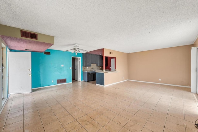 unfurnished living room featuring light tile patterned floors, a textured ceiling, and ceiling fan