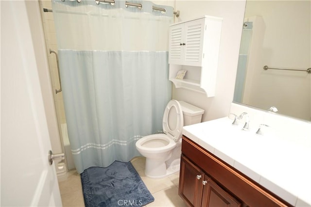 bathroom featuring tile patterned floors, toilet, a shower with shower curtain, and vanity