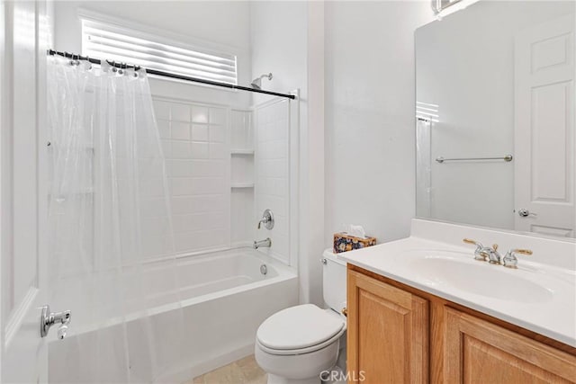 full bathroom with vanity, toilet, and shower / bath combo with shower curtain