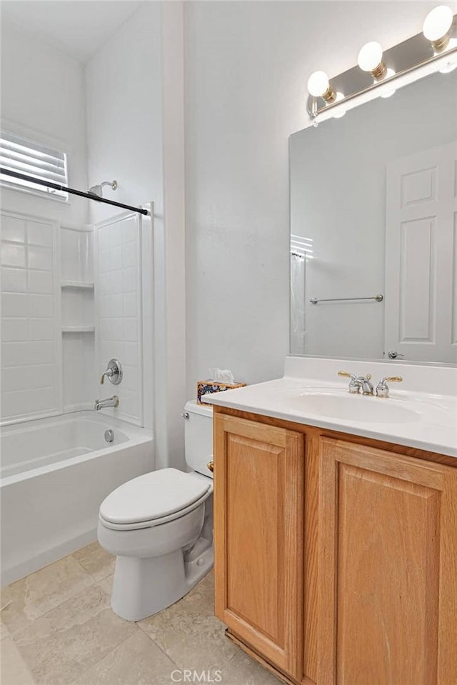 full bathroom featuring vanity, bathtub / shower combination, tile patterned floors, and toilet