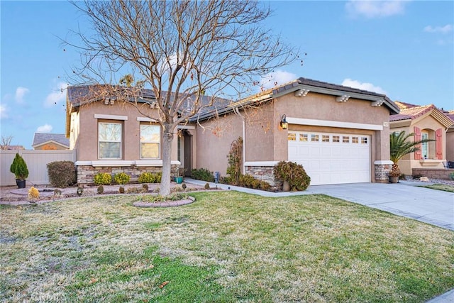 view of front of house featuring a garage and a front yard