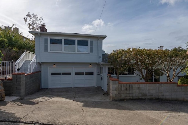 view of front of home featuring a garage