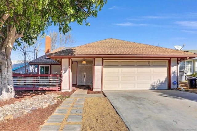 ranch-style house featuring a garage