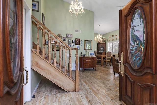 entrance foyer featuring a chandelier