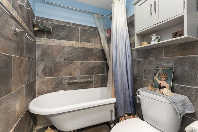 bathroom featuring tile walls, toilet, and shower / bath combo