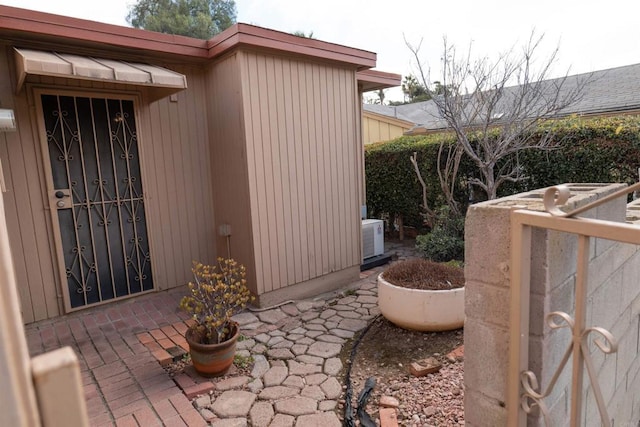 view of home's exterior with cooling unit