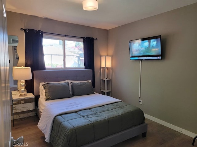 bedroom with wood-type flooring