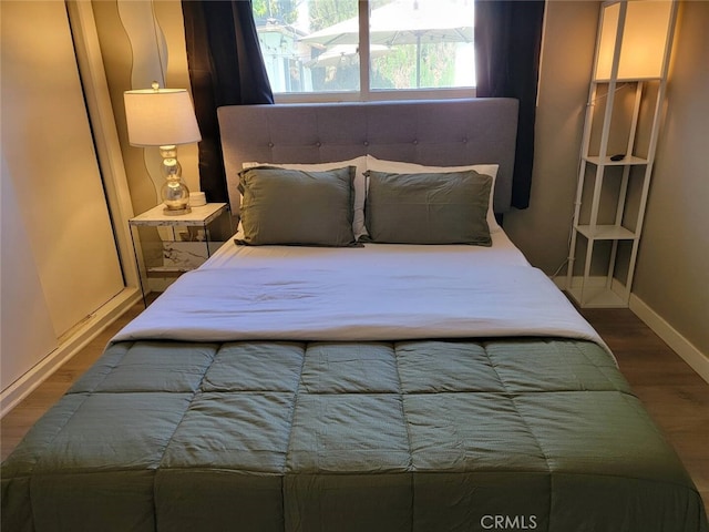 bedroom featuring hardwood / wood-style floors