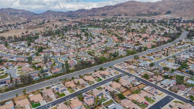 drone / aerial view with a residential view and a mountain view