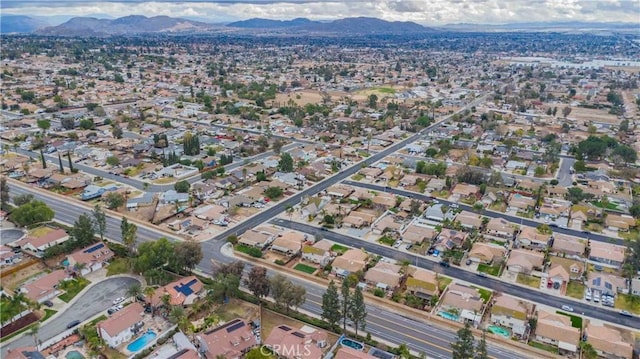 bird's eye view with a residential view and a mountain view