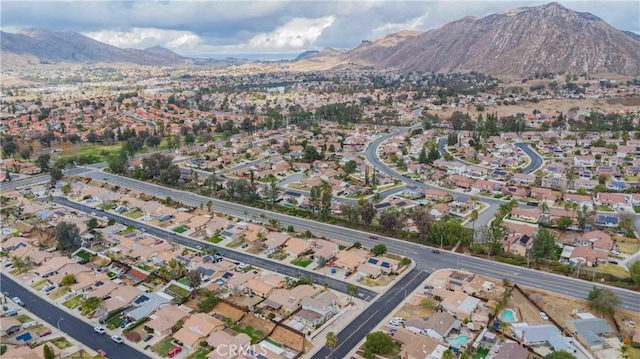 bird's eye view featuring a residential view and a mountain view