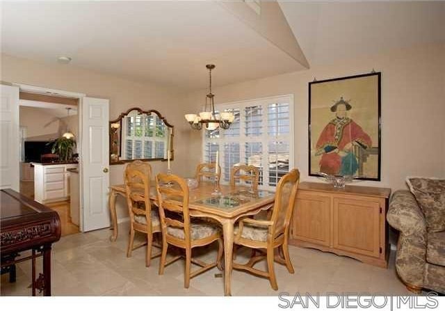 dining room featuring a chandelier