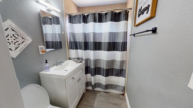 bathroom with vanity and a shower with shower curtain