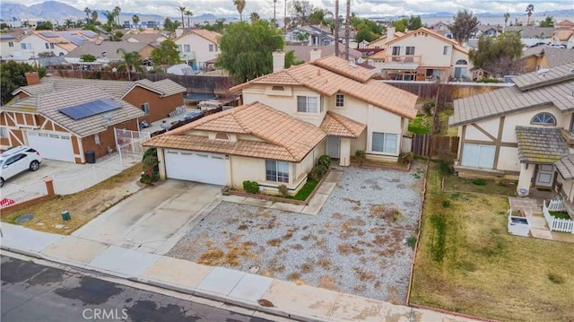 bird's eye view featuring a residential view and a mountain view