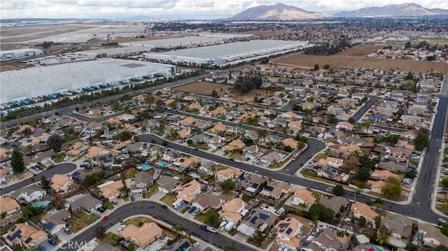 bird's eye view featuring a residential view and a mountain view