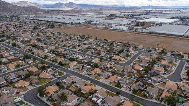 drone / aerial view featuring a mountain view