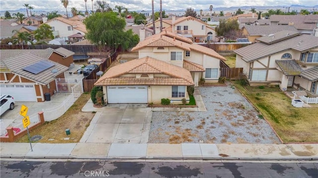 birds eye view of property with a residential view