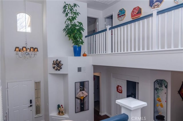 interior space featuring an inviting chandelier