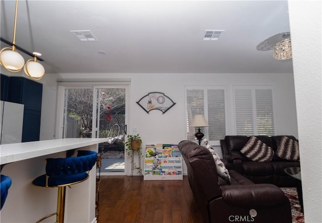 living room with dark hardwood / wood-style floors