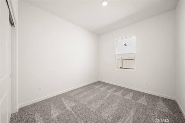 unfurnished room with carpet