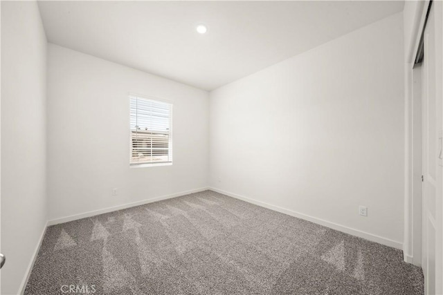 spare room with carpet floors