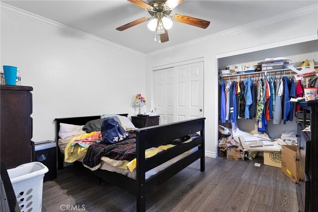 bedroom with hardwood / wood-style flooring, ceiling fan, and ornamental molding