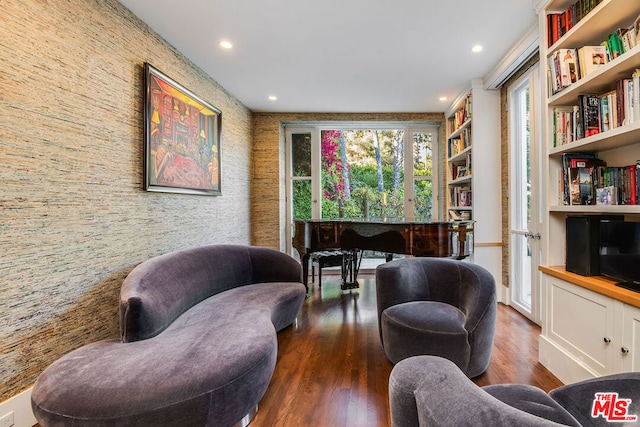 living area with dark hardwood / wood-style flooring