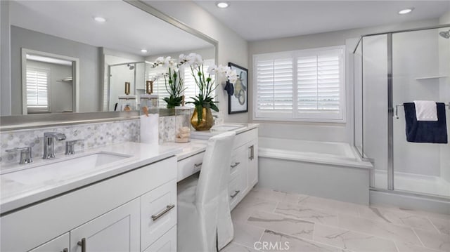 bathroom featuring vanity and plus walk in shower