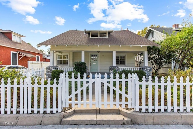 view of front of home featuring covered porch