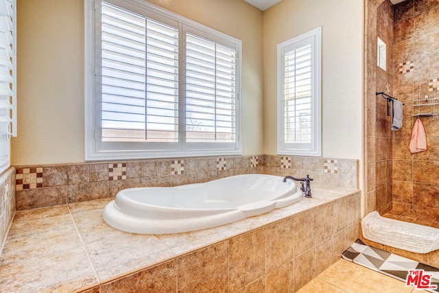 bathroom with independent shower and bath