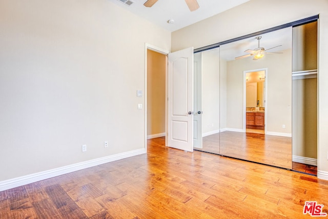 unfurnished bedroom featuring a closet, ceiling fan, and light hardwood / wood-style flooring