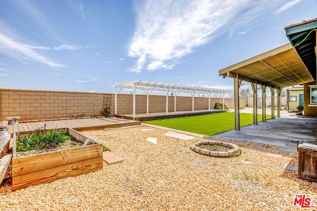 view of yard featuring a patio and a pergola