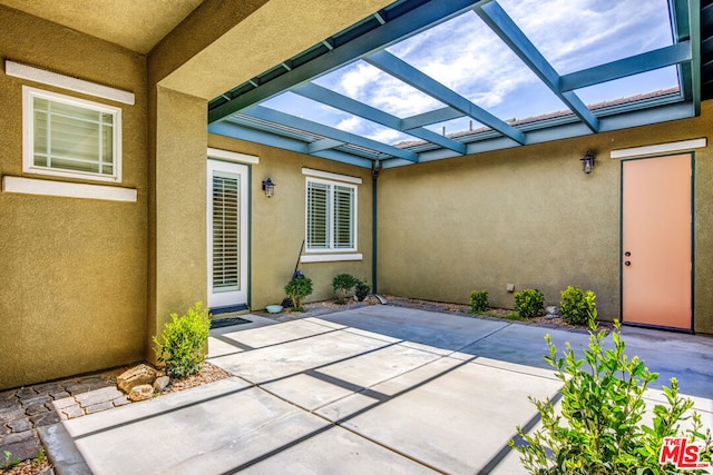 view of patio featuring a pergola