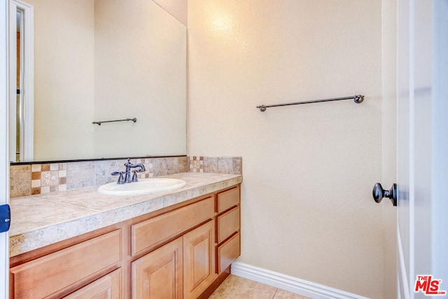 bathroom with vanity and tile patterned floors