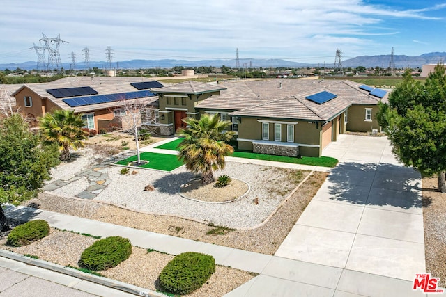 view of front of property featuring a mountain view