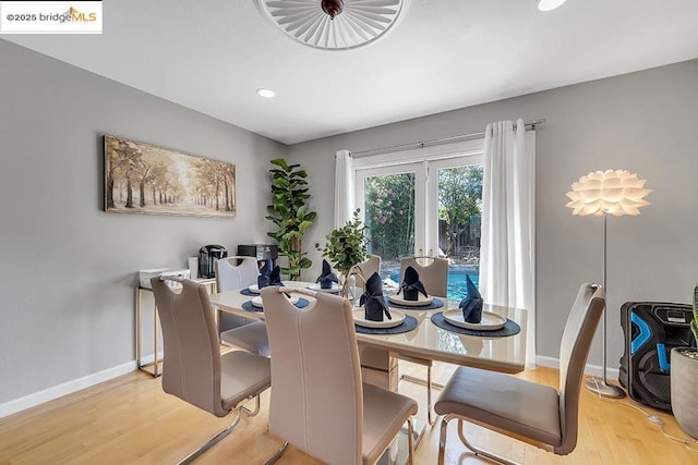 dining room with light hardwood / wood-style floors