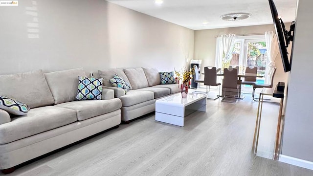 living room featuring light hardwood / wood-style flooring