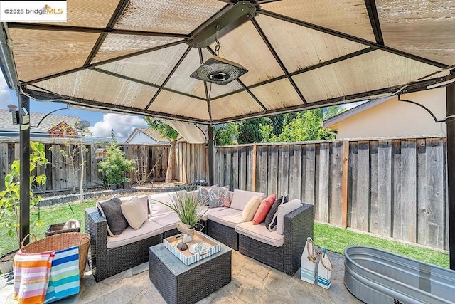 view of patio / terrace with a gazebo and an outdoor hangout area