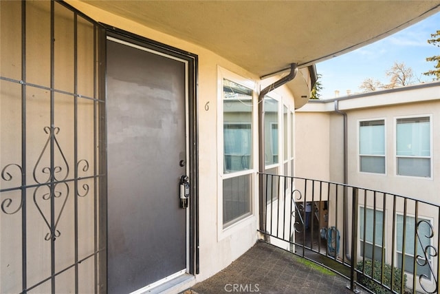 doorway to property with a balcony