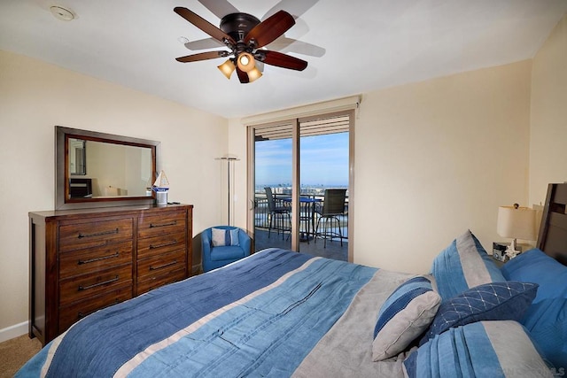 bedroom featuring access to exterior, ceiling fan, and carpet flooring