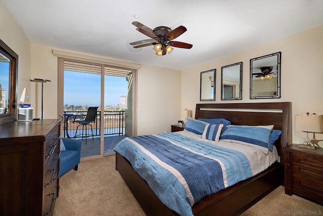 carpeted bedroom featuring access to outside and ceiling fan