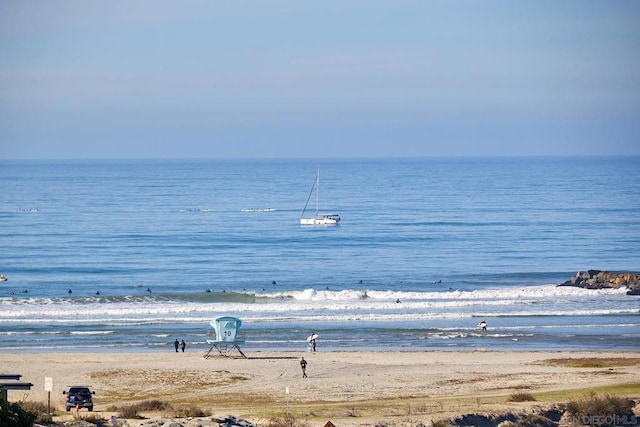 view of water feature featuring a beach view