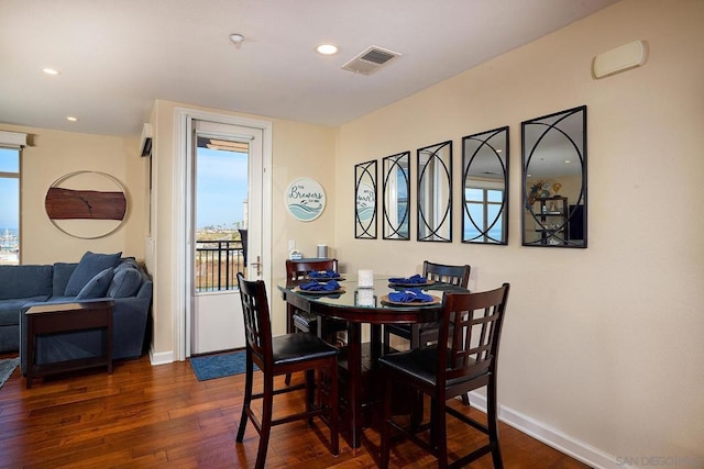 dining room featuring dark wood-type flooring