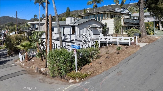 view of front of property with a mountain view