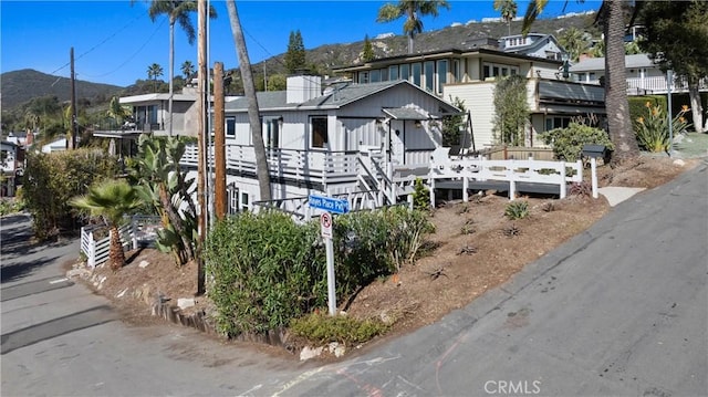 31955 10th Ave, Laguna Beach, CA 92651 - townhome / multi-family property with a deck with mountain view and a residential view