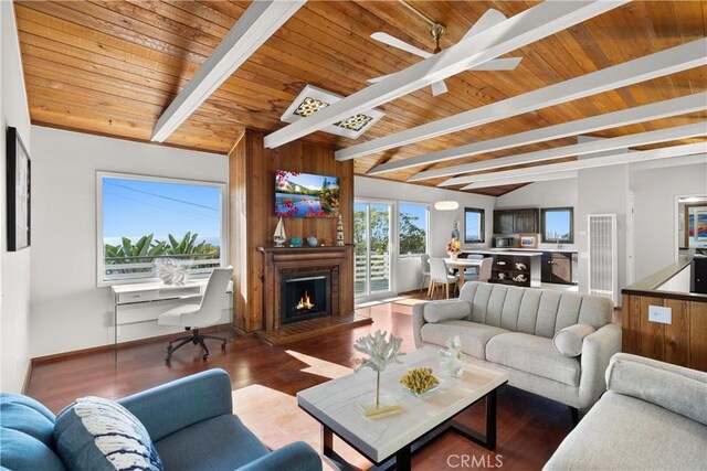 31955 10th Ave, Laguna Beach, CA 92651 - living area with a fireplace, a ceiling fan, wooden ceiling, wood finished floors, and baseboards